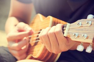 Playing ukulele